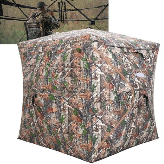Camouflage hunting blind with a person in camouflage gear in the background