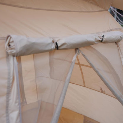 Inside view through arched mesh window of beige family inflatable camping tent, spacious for 6 people glamping

