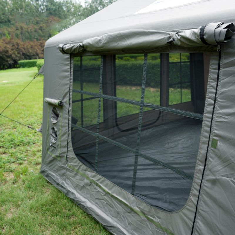 Green 6-8 person large inflatable camping tent with mesh windows and waterproof cover on white background