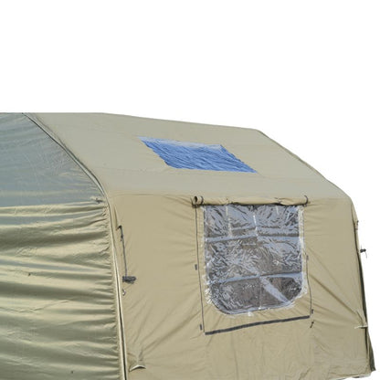 Beige tent with a window and blue patch on a white background