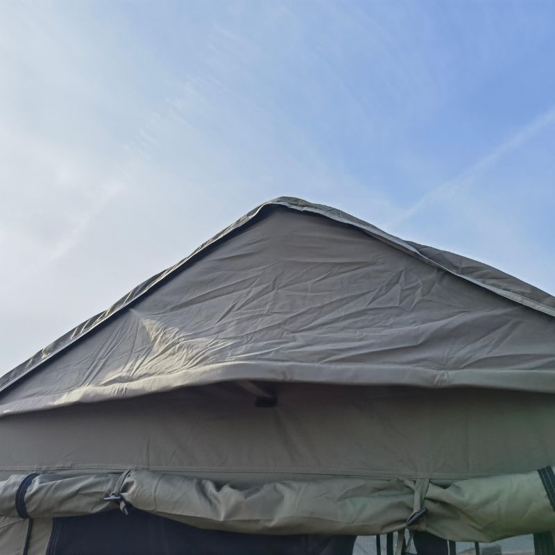 Top view of a tent with a clear blue sky background