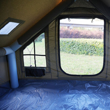 Interior of a tent with a view of greenery outside