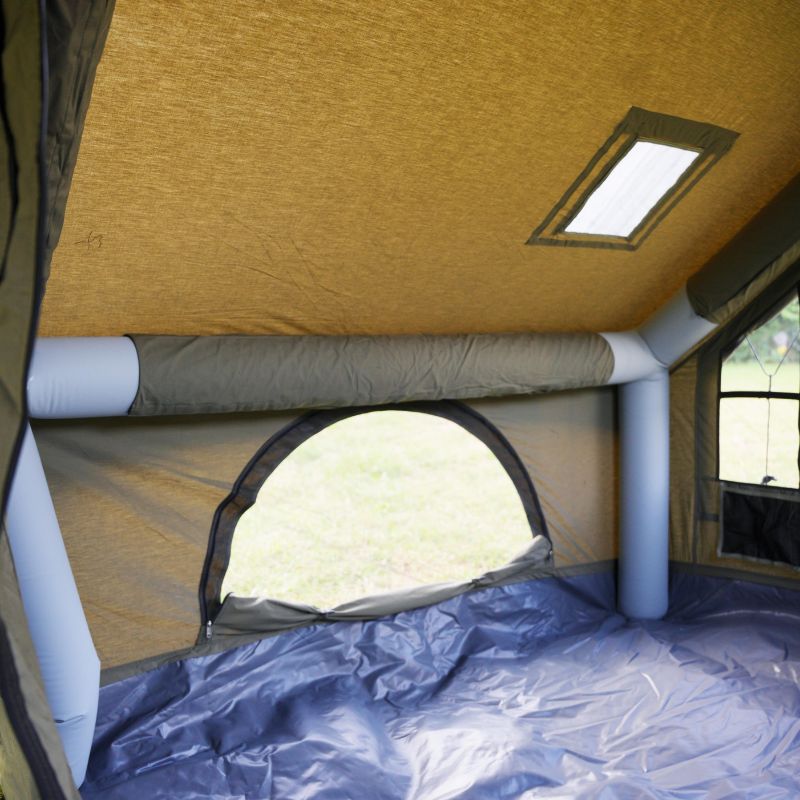 Interior of a tent with a window and ceiling light