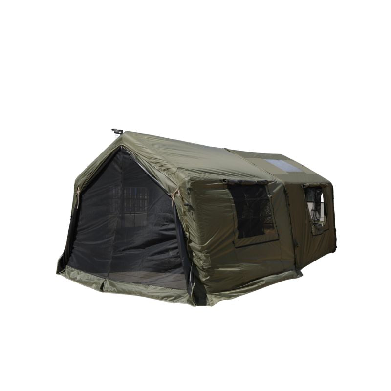 Green camping tent with a black interior on a white background