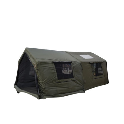 Green camping tent with mesh windows on a white background