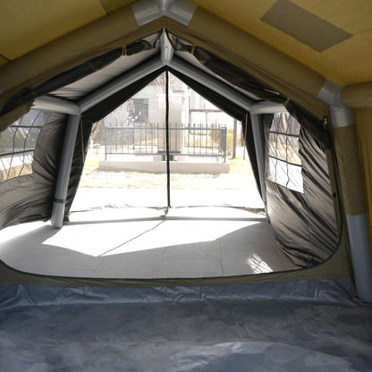 Inflatable tent with a clear window showing an outdoor setting.