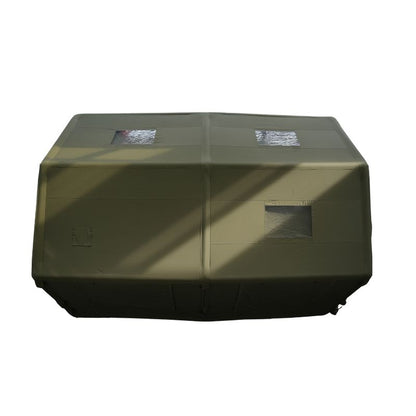 Green rectangular object with clear panels on a white background