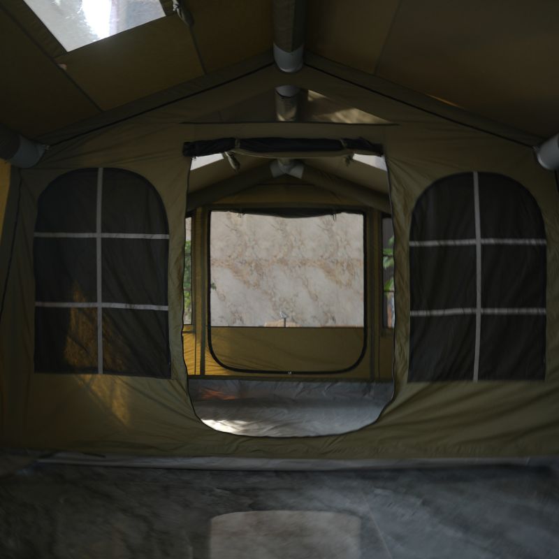 Inside view of a tent with a windowed door leading to an outdoor area.