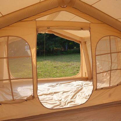 Beige tent with mesh windows showing a grassy outdoor area.