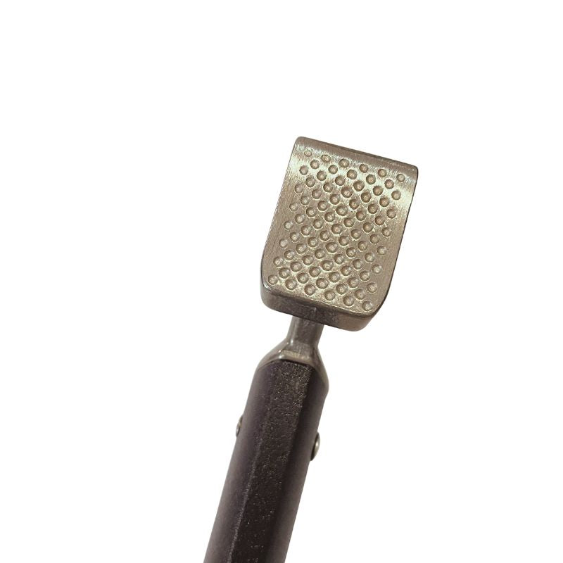 Metallic tool with textured head on a white background