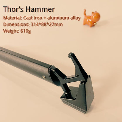 Black metal tool with text about material, dimensions, and weight on a beige background