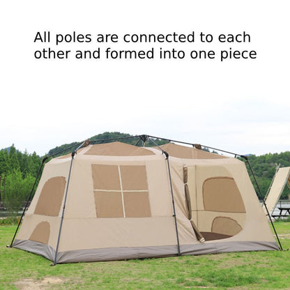 Beige camping tent with connected poles on a grassy field with trees in the background