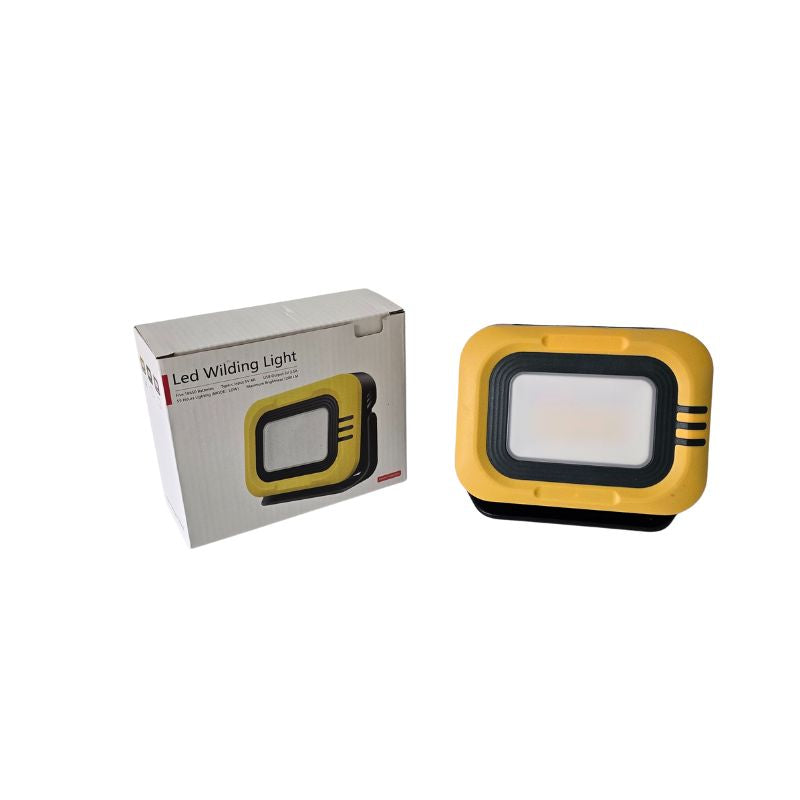 Yellow and black LED worklight with packaging on a white background