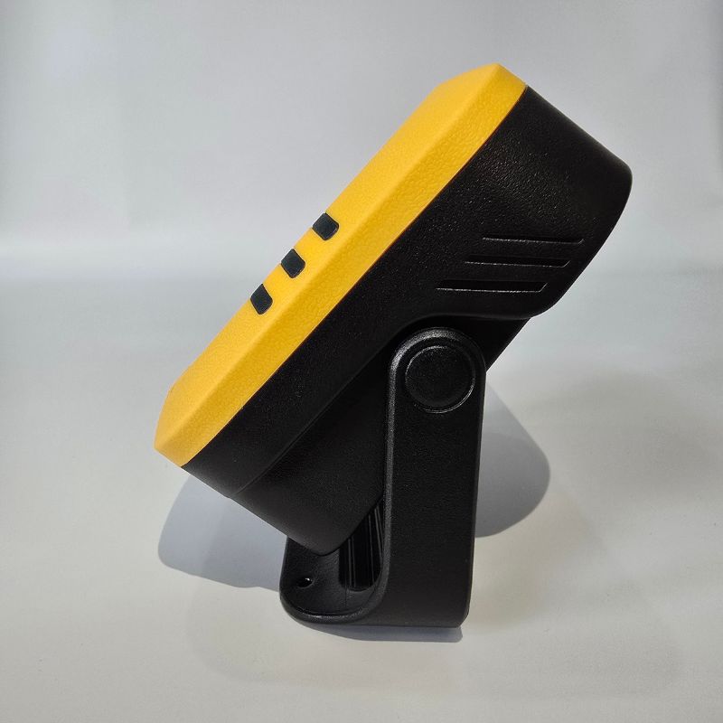 Yellow and black device on a white background