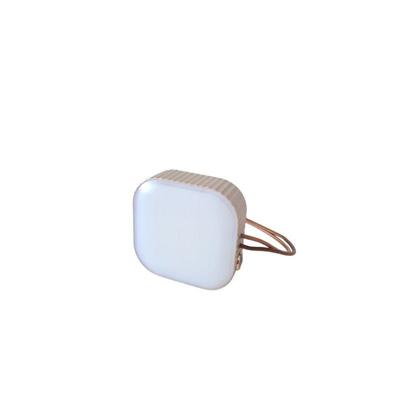 Square-shaped light with a white front and gold rim on a white background