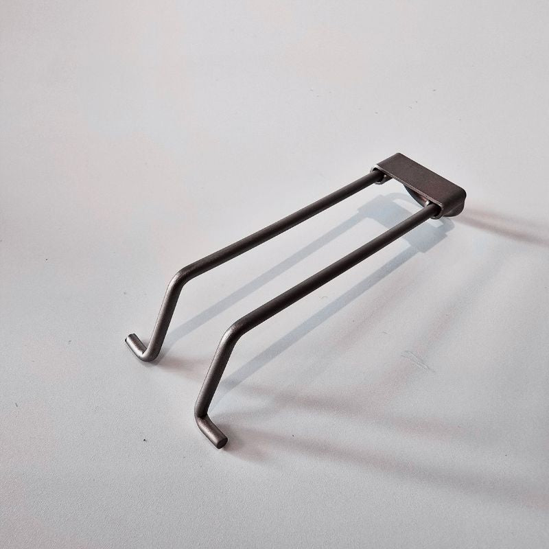 Metal bracket on a light gray background