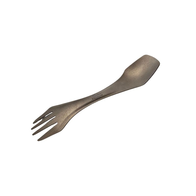 Metallic spork on a white background