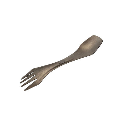 Metallic spork on a white background