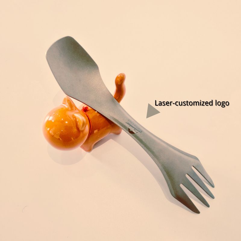 Metallic fork and spoon set on a beige background with 'Laser-customized logo' text.
