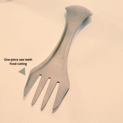 Gray utensil with saw teeth on a beige background