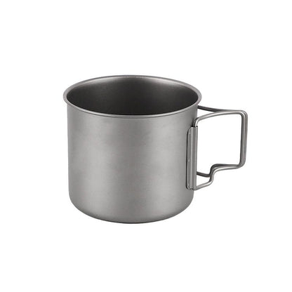 Silver metal mug with handle on a white background