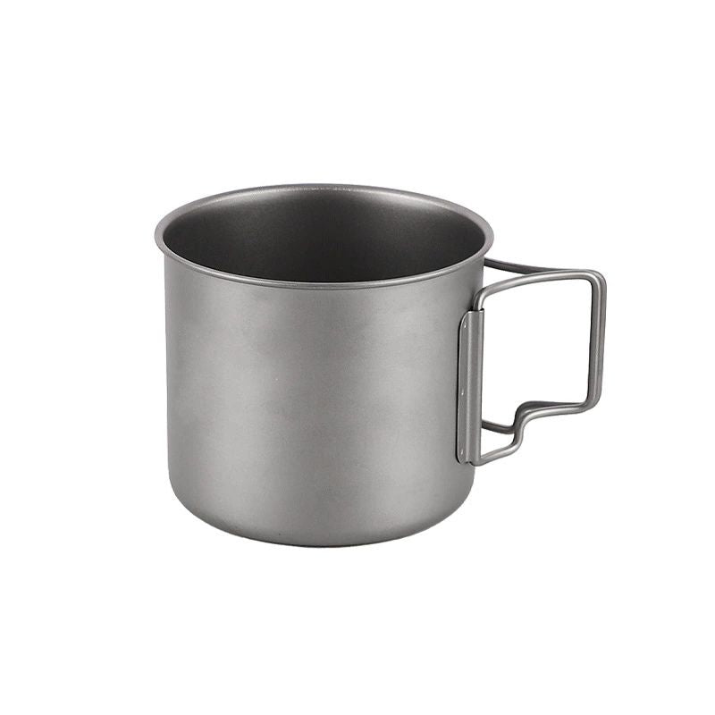 Silver metal mug with handle on a white background