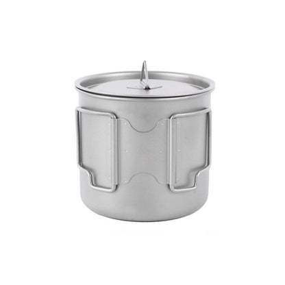 Stainless steel mug with handle on a white background
