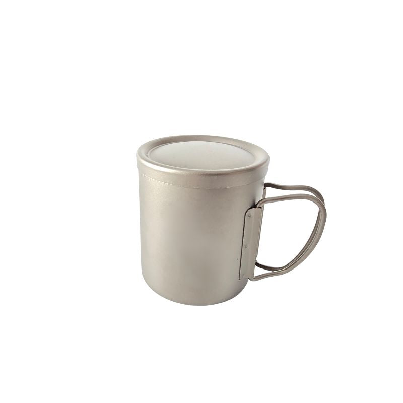 Silver mug with a handle on a white background