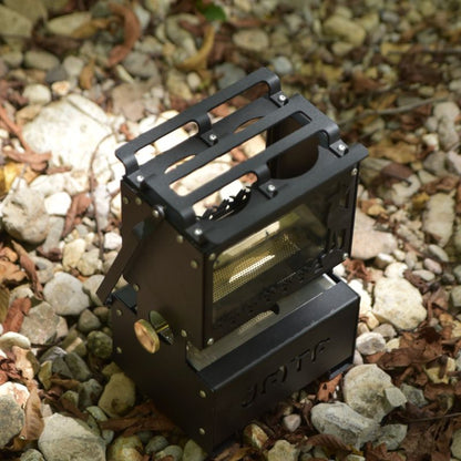 Portable stove on a rocky ground