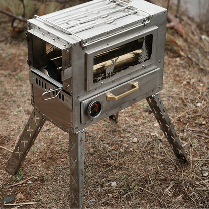 Metallic camping stove on a stand outdoors
