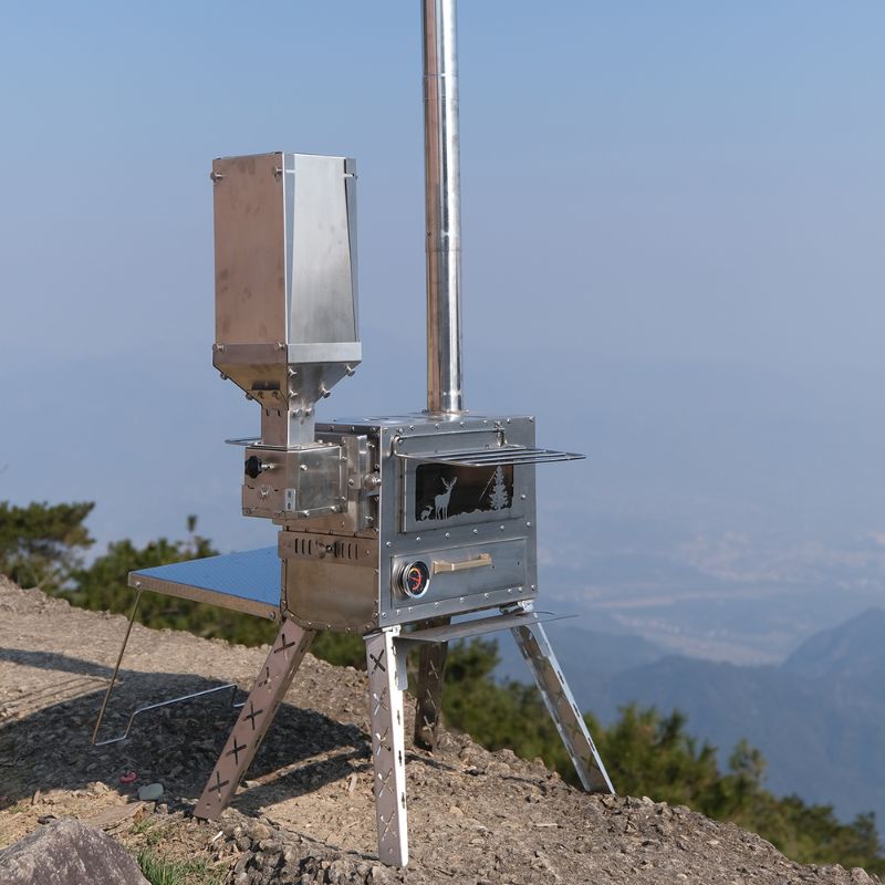 Portable stove on a mountain with a scenic background