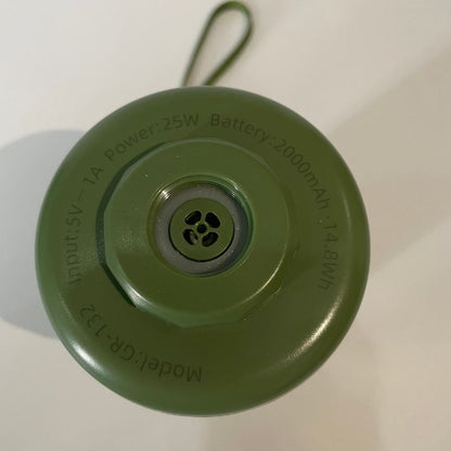 Green electronic device with text on a white background