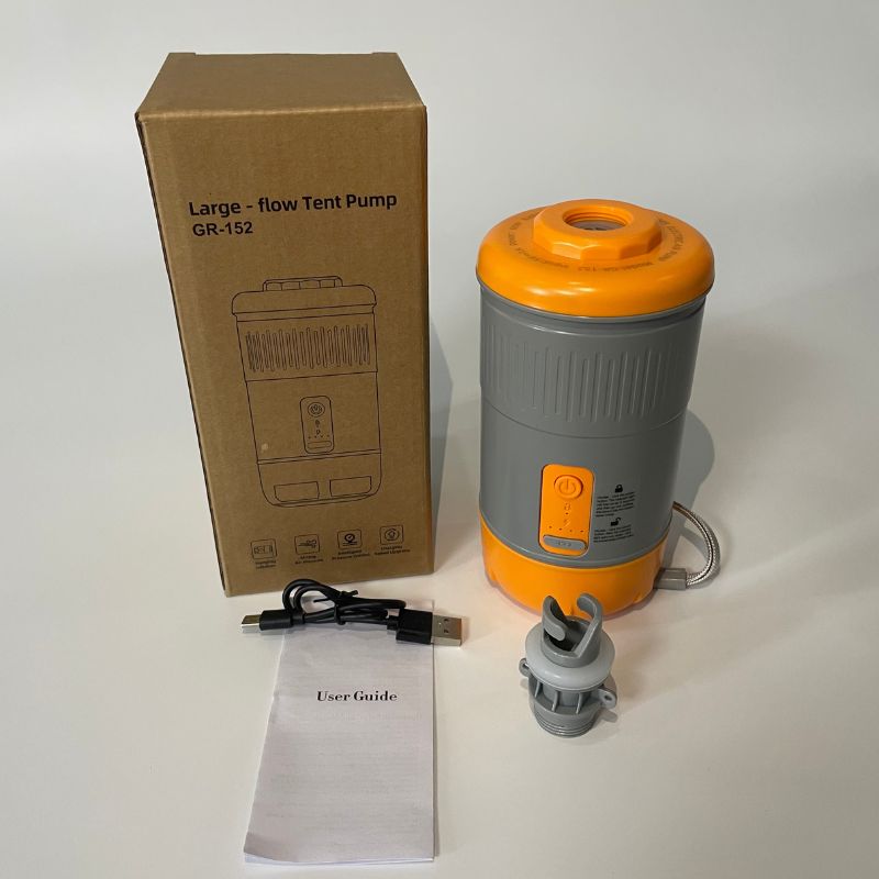 Orange and gray tent pump with packaging, user guide, and USB cable on a white background