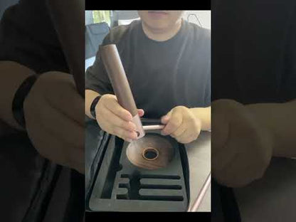 Unboxing and assembly of the Boertala walnut camping light. A user unzips the beige carrying case, removes the foam-packed components, screws together the metal tripod legs and wooden base, and hangs the LED lantern with its walnut shade on the hook stand