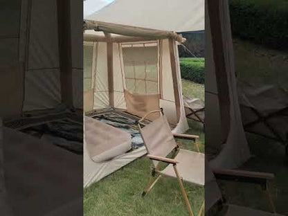 Beige 3-4 person ridge inflatable tent quick setup video with chairs and table in outdoor glamping campsite