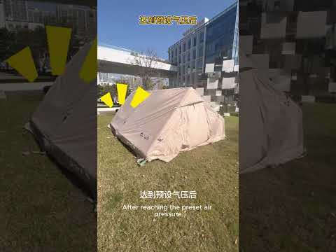 Boertala GR-132 high-pressure electric pump automatically inflating a beige camping tent outdoors on grass