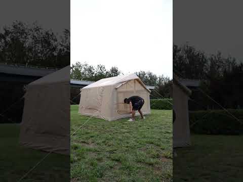 Khaki beige 6-8 person large inflatable tent quick setup video with person inflating in outdoor grassy field